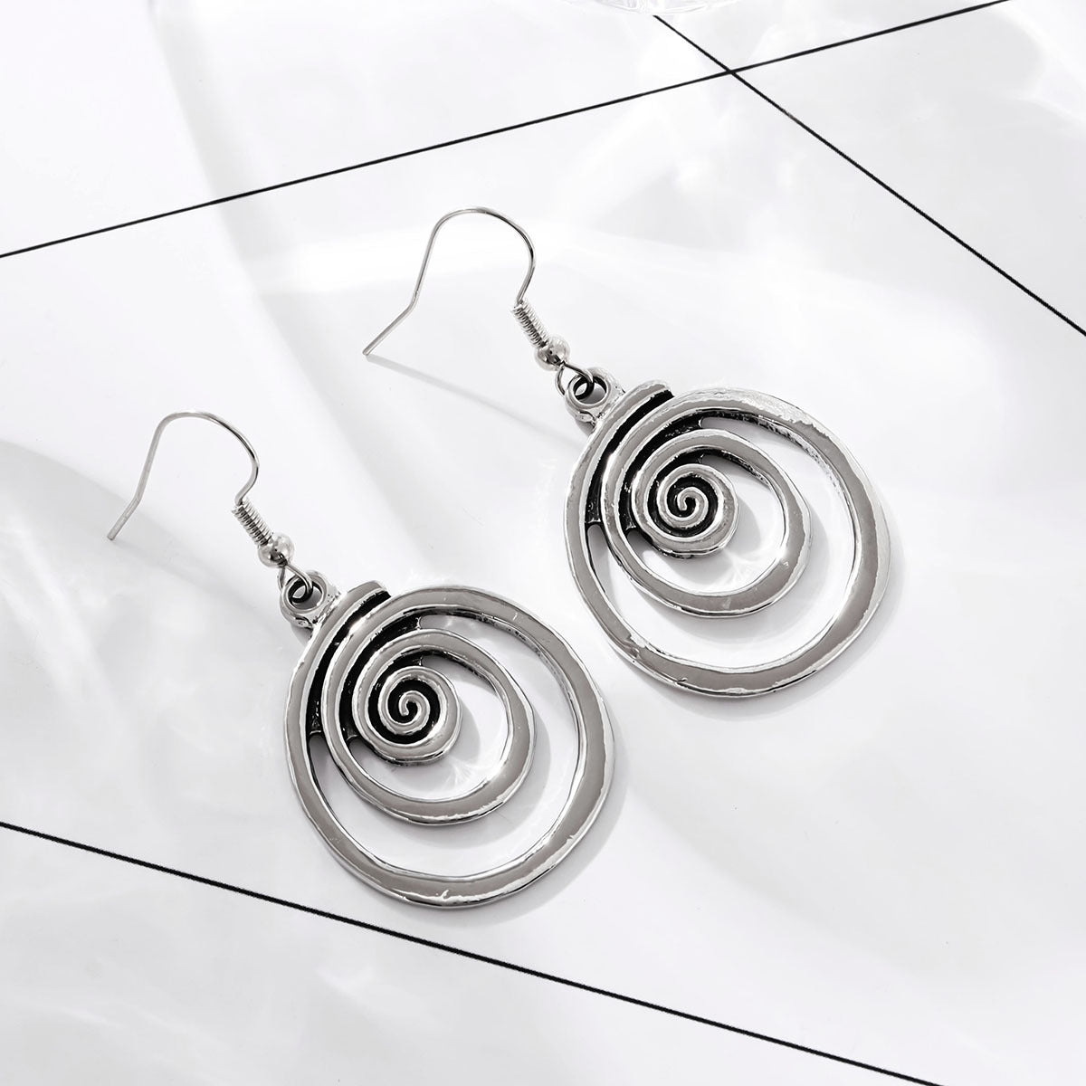 Pendientes desgastados en espiral geométricos RETRO con personalidad