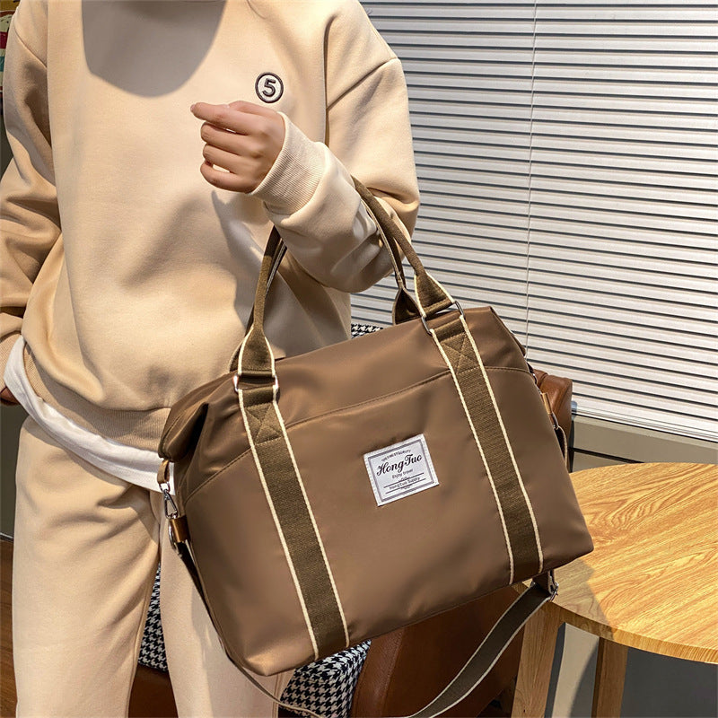 Sac de voyage Portable pour femmes, sac à bagages léger et étanche de grande capacité