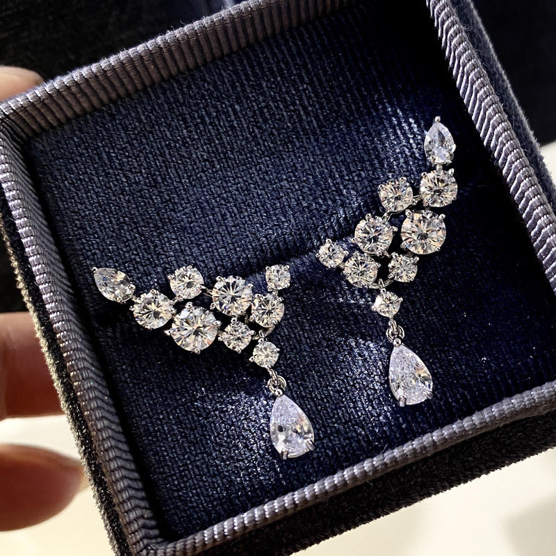 Boucles d'oreilles goutte d'eau ailes en or blanc Zircon