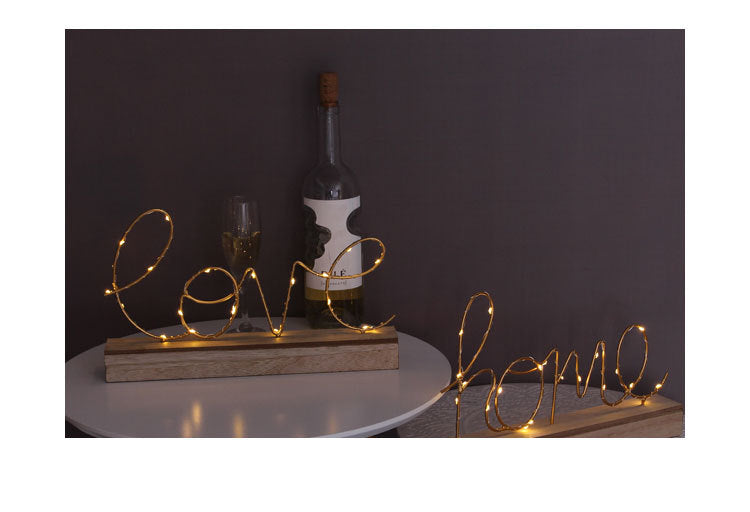 Leuchtschrift Amor a casa