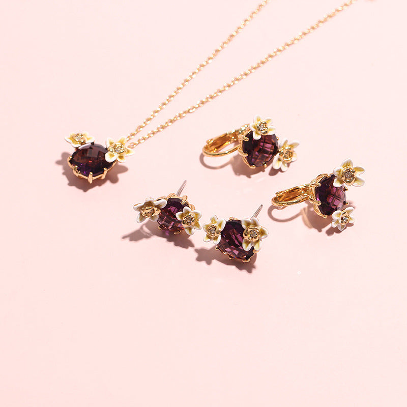 Boucles d'oreilles avec pierres précieuses rouges, fleur de vanille