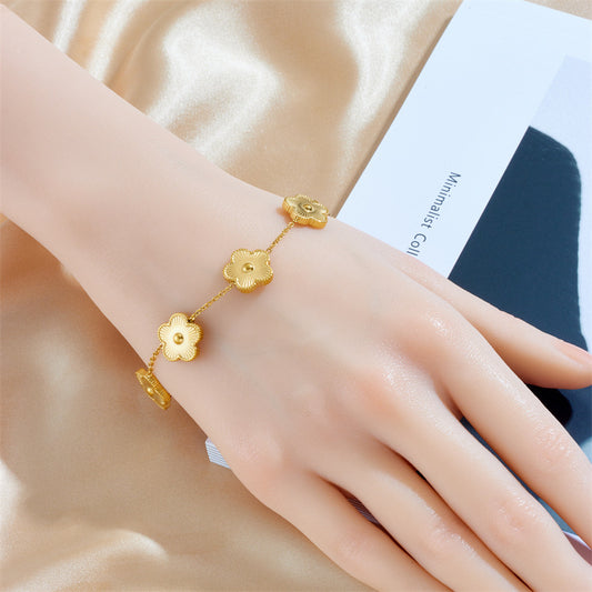 Bracelet d'accessoires de chaîne de connexion de fleurs plaquées or de conception minoritaire de mode
