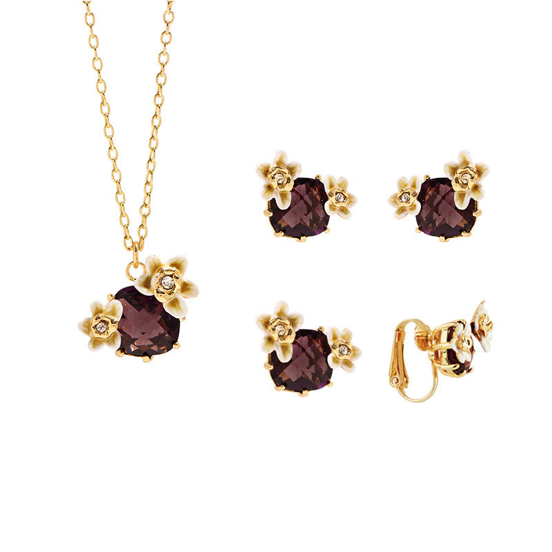 Boucles d'oreilles avec pierres précieuses rouges, fleur de vanille