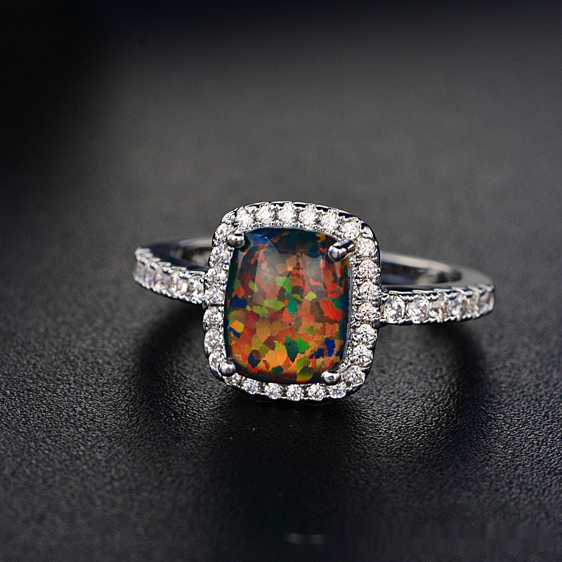 Anillo de ópalo de diamante rosa multicolor europeo y americano circonita con incrustaciones de moda Simple