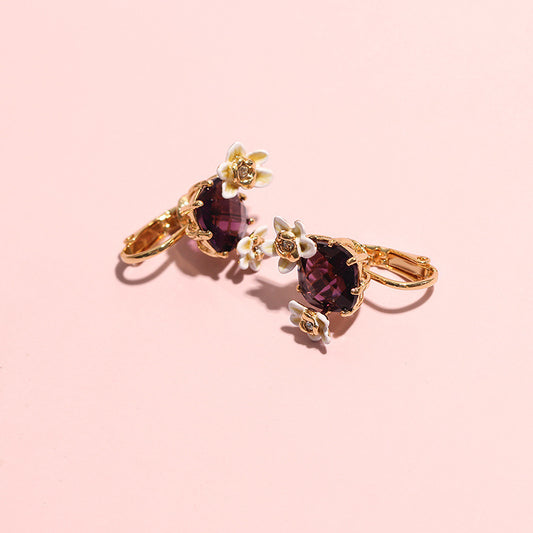 Boucles d'oreilles avec pierres précieuses rouges, fleur de vanille