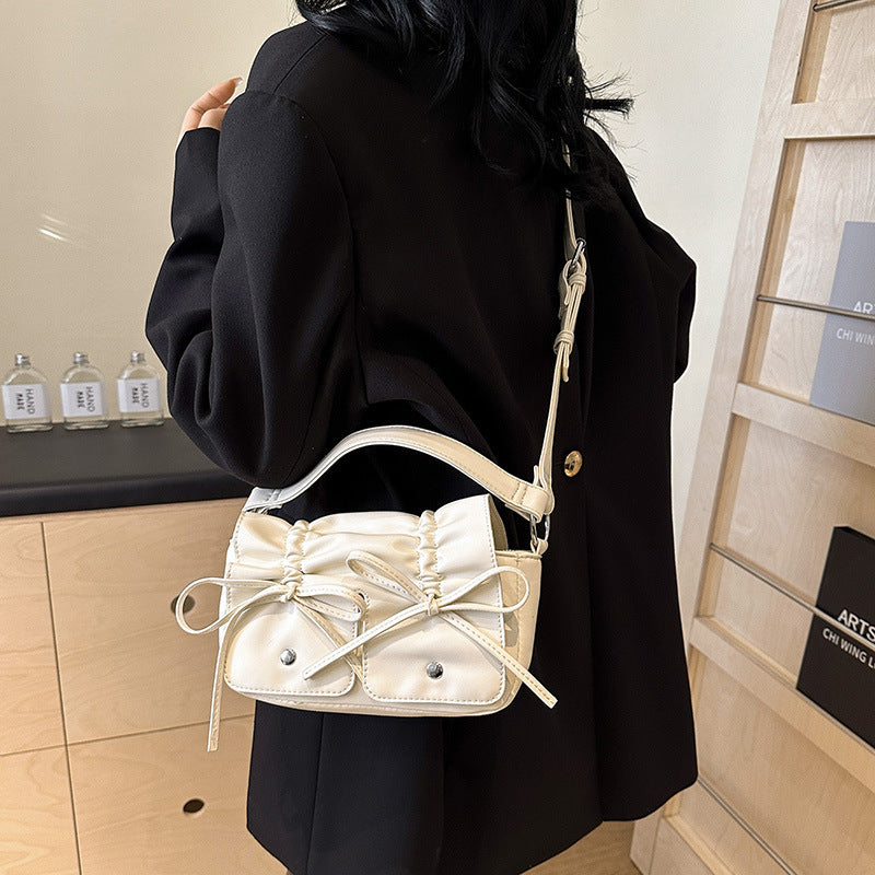 Sac à bandoulière assorti en cuir souple de style occidental