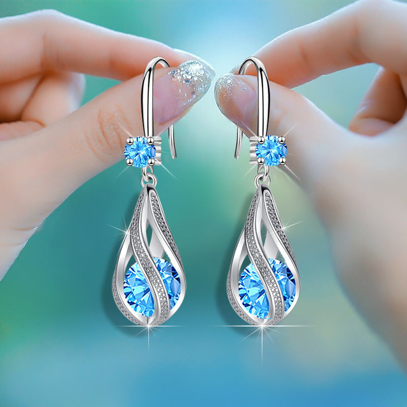 Boucles d'oreilles en forme de larme rotative pour femmes