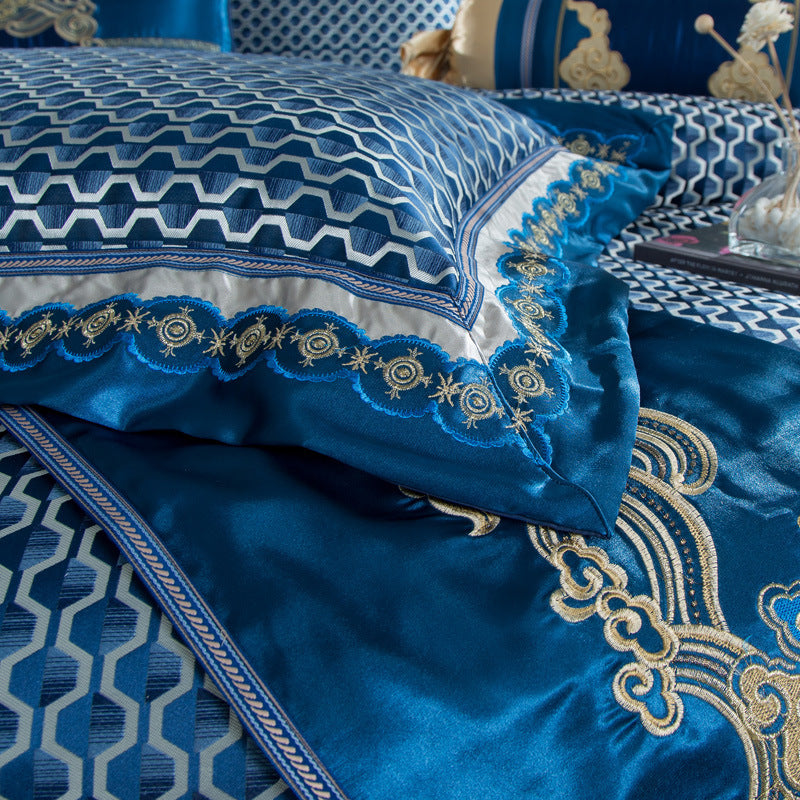 Sábana de cuatro piezas en jacquard bordado