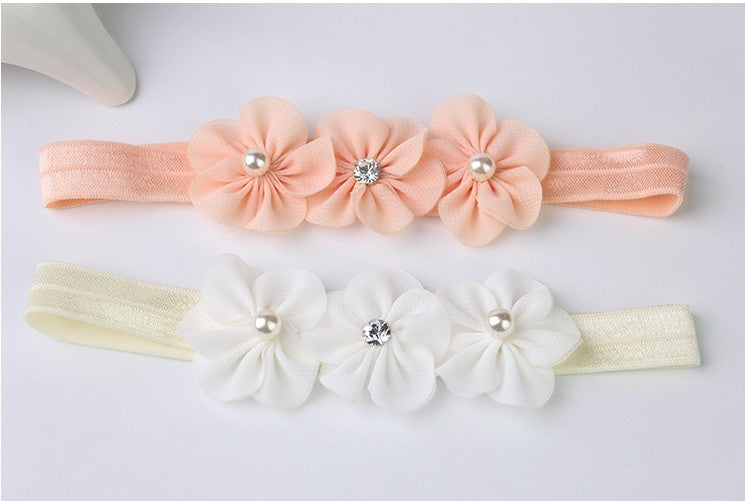 Bandeau bébé trois petites fleurs de prunier