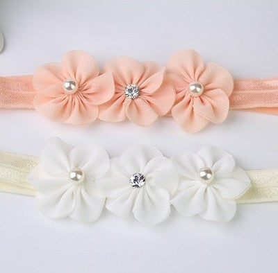 Bandeau bébé trois petites fleurs de prunier