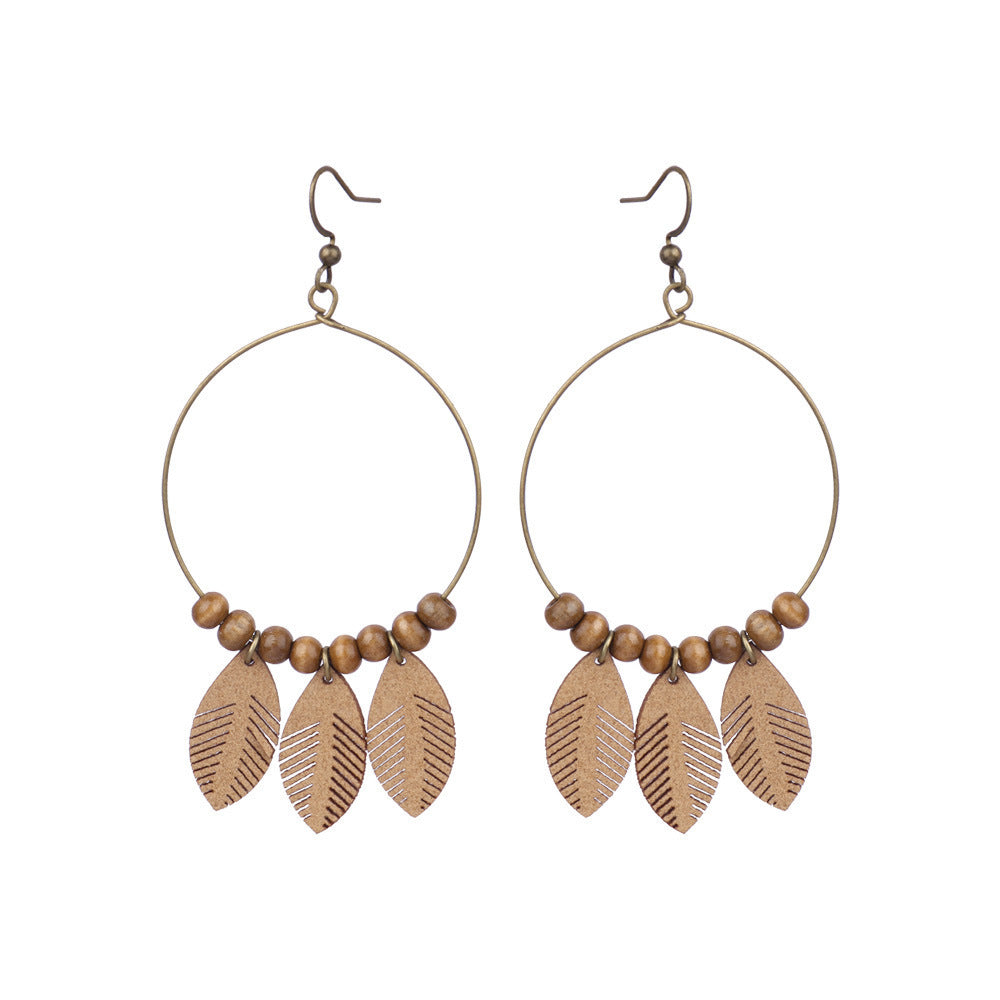 Style gland boucles d'oreilles femme feuille cercle métal cuir boucles d'oreilles