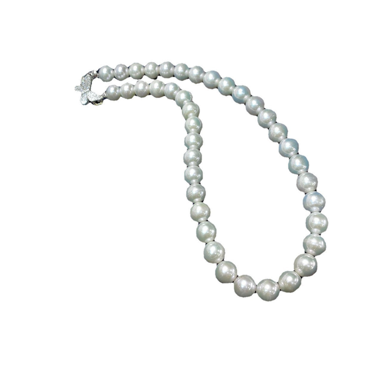 Collier de perles d'eau douce, lumière extrêmement forte, cercle presque parfait