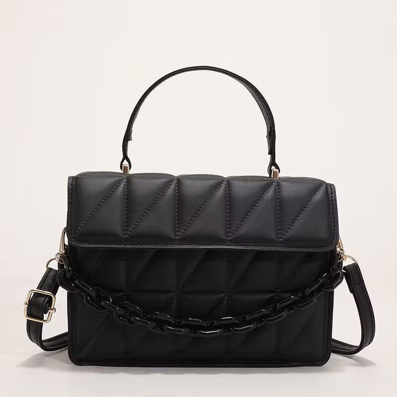 Bolso bandolera de hombro con textura simple y moderno