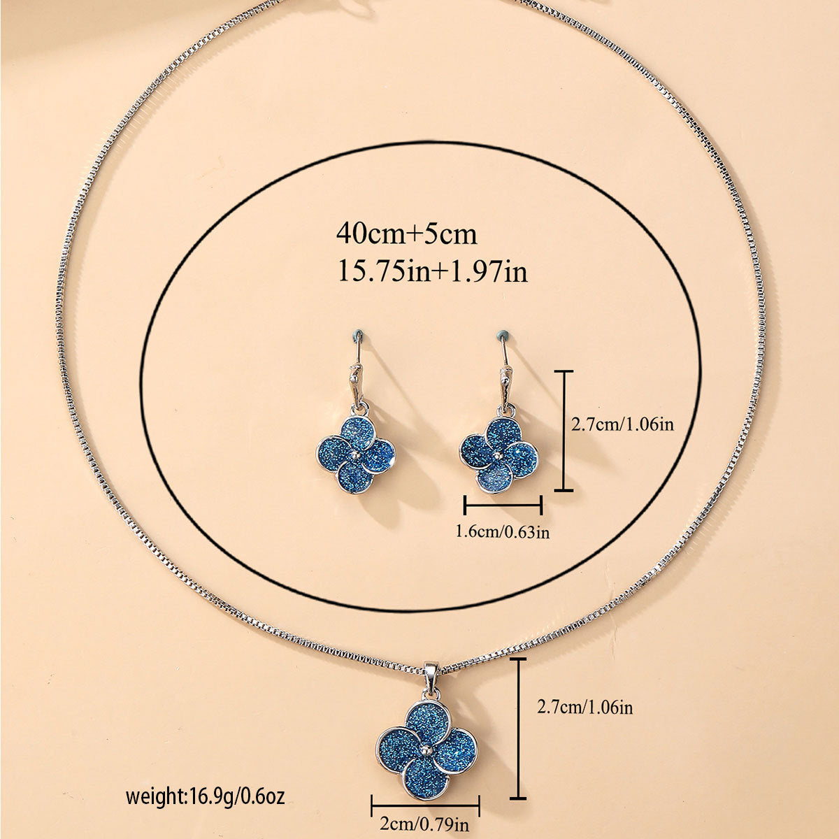 Lot de deux boucles d'oreilles et pendentif pour femme