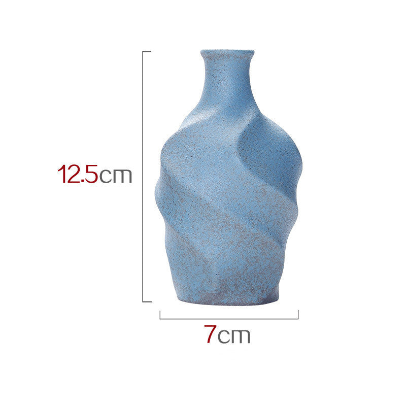 Vase en céramique simulant un vase à fleurs sèches