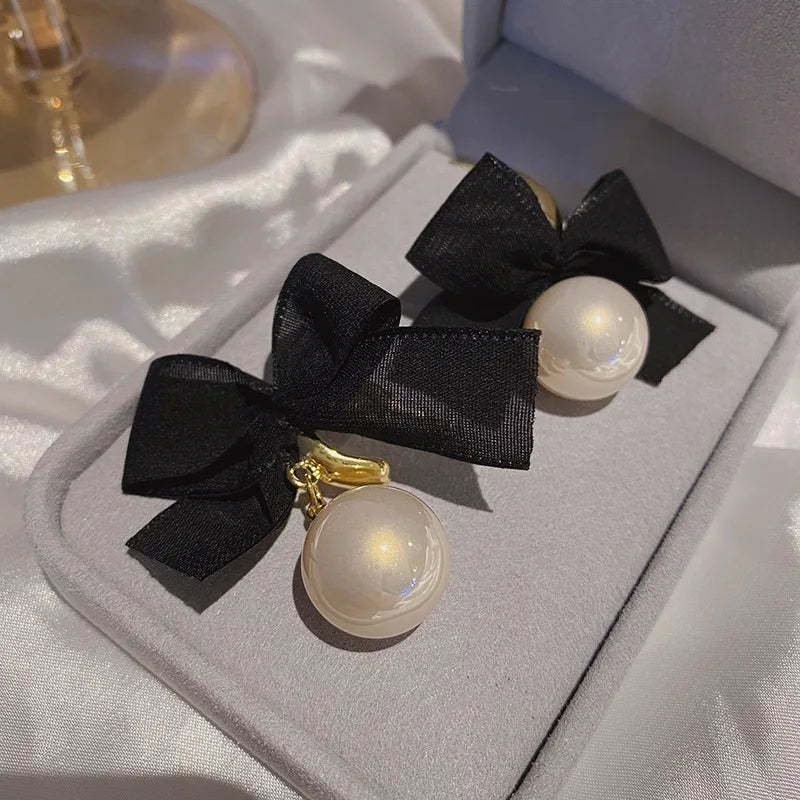 Boucles d'oreilles françaises élégantes avec nœud noir