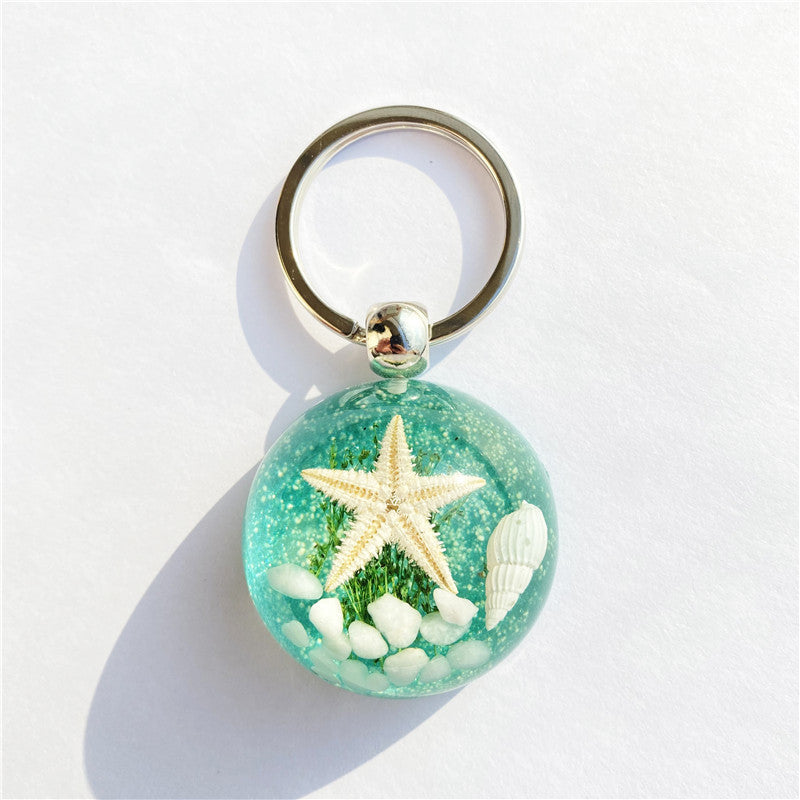 Colgante de llavero de ámbar de estrella de mar
