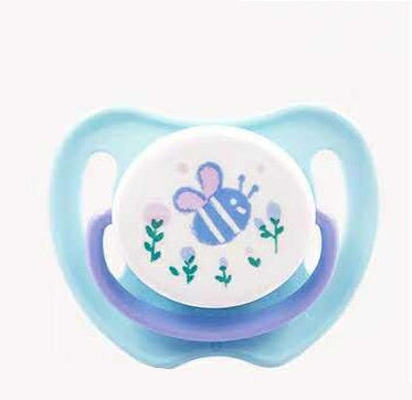 Bébé avec tétine
