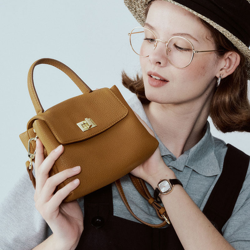 Mini sac portable en cuir de vache de première couche