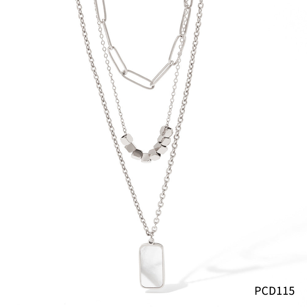 Collar de concha blanca rectangular hueco gemelo de tres capas