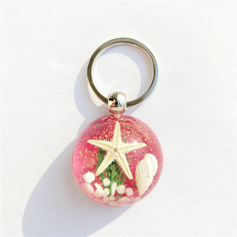 Colgante de llavero de ámbar de estrella de mar