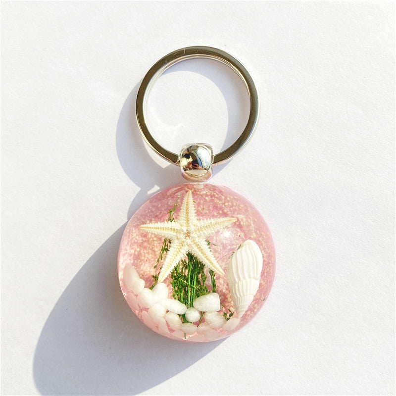 Colgante de llavero de ámbar de estrella de mar