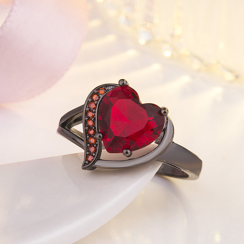 Anillo en forma de corazón con circonita grande, color chapado en oro negro, en forma de corazón