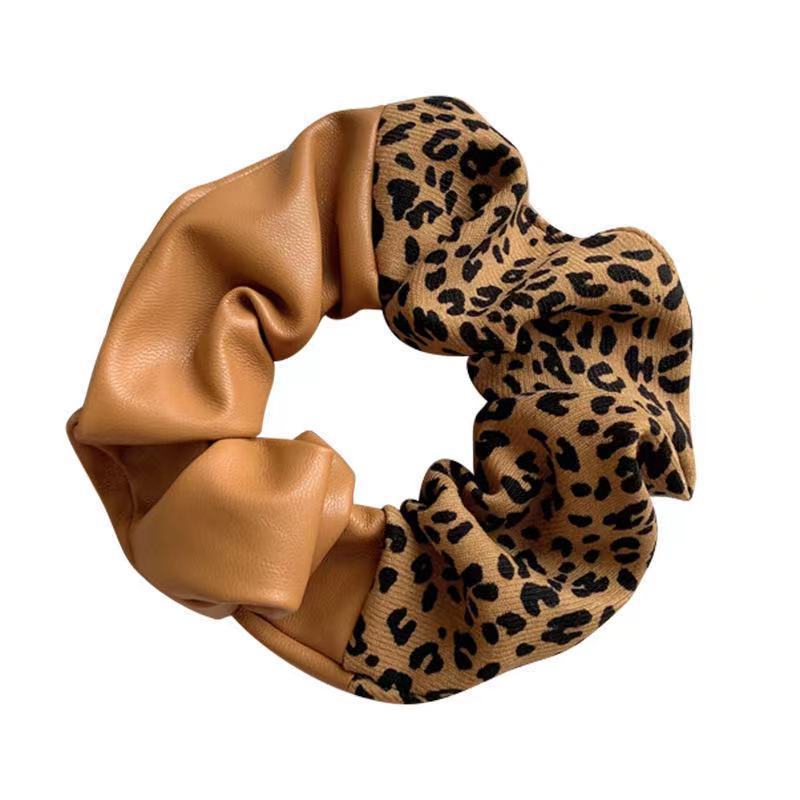 Anillo para el cabello del intestino grueso con bloques de color nuevo y costuras de cuero con estampado de leopardo