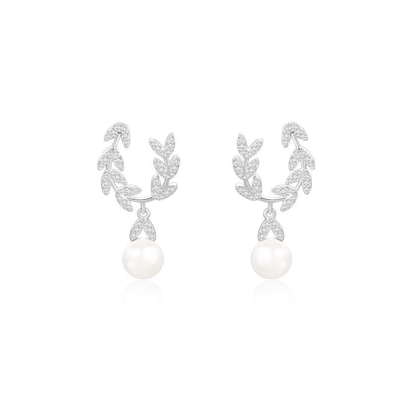 Boucles d'oreilles en perles de feuilles d'aiguille en argent à la mode
