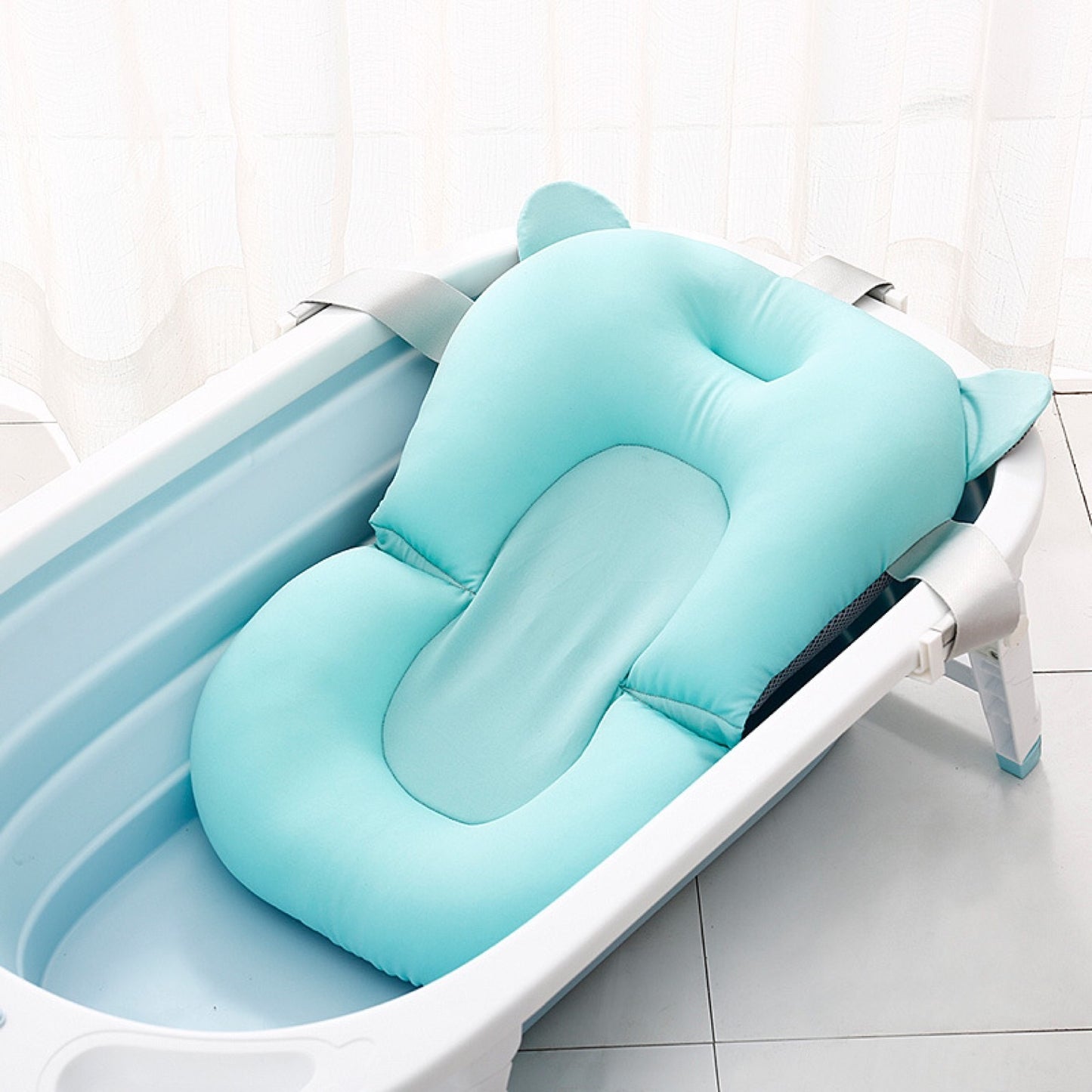 Le filet de bain à suspension pour bain de bébé peut s'asseoir sur le support de bain