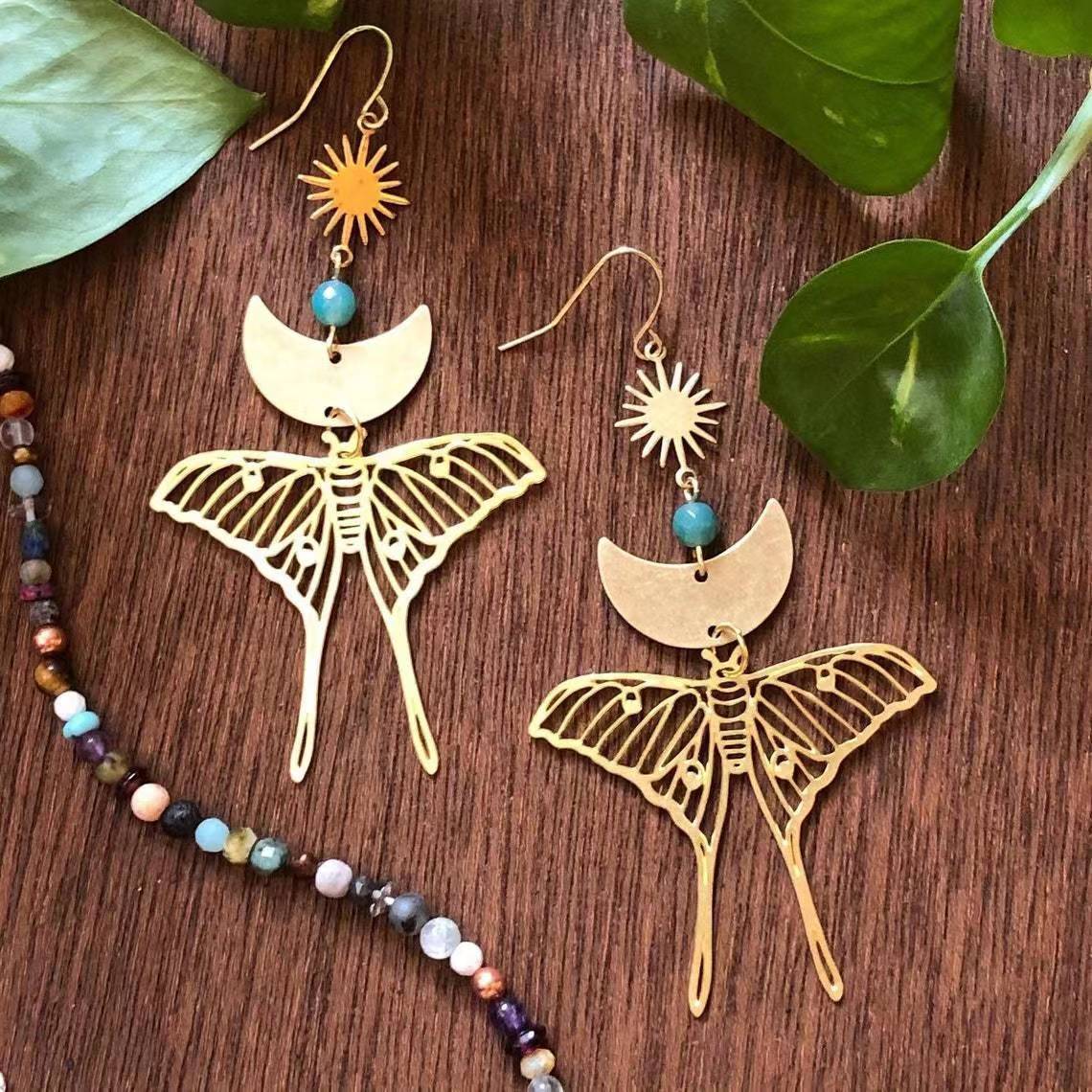 Mode exagérée lune papillon boucles d'oreilles en métal tempérament conception sauvage