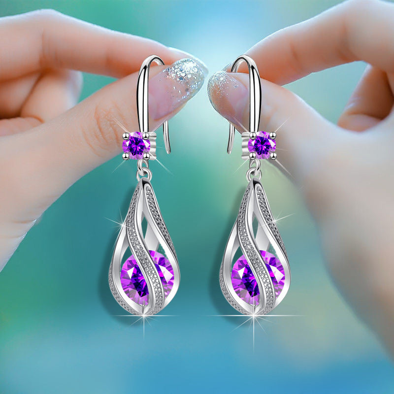 Boucles d'oreilles en forme de larme rotative pour femmes