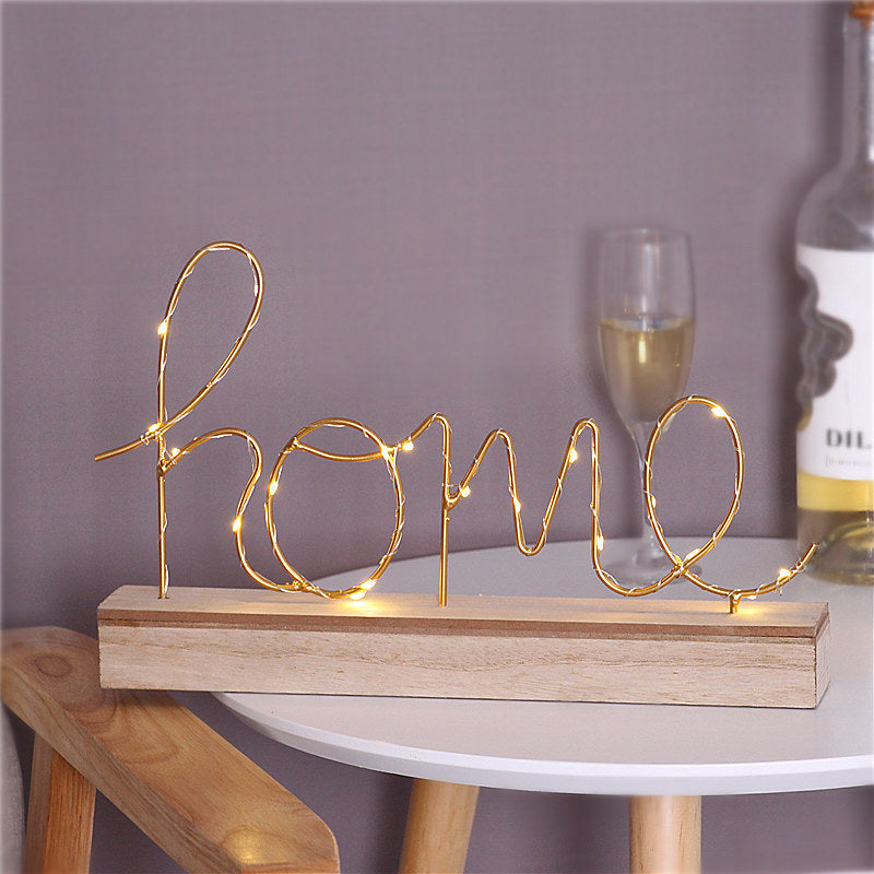 Leuchtschrift Amor a casa