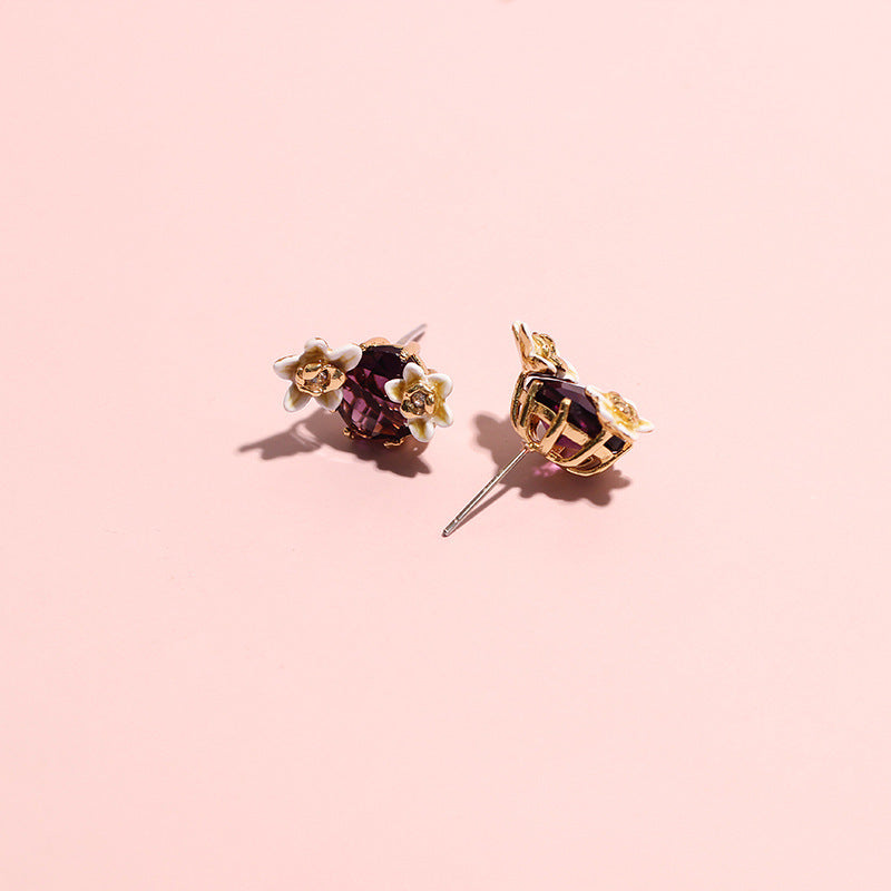 Boucles d'oreilles avec pierres précieuses rouges, fleur de vanille
