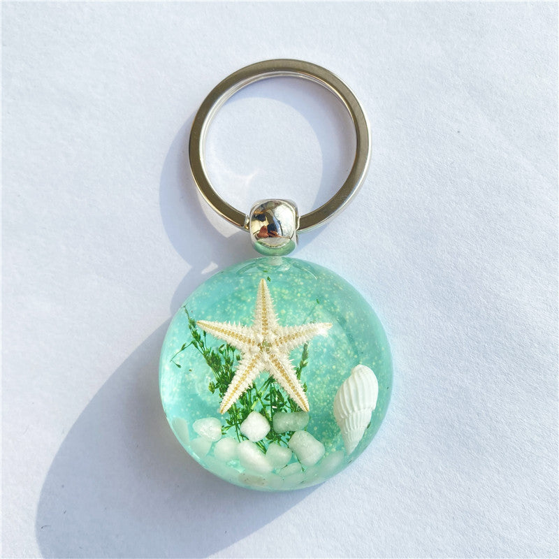 Colgante de llavero de ámbar de estrella de mar