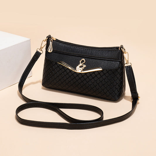 Práctico bolso bandolera con relieve Lingge