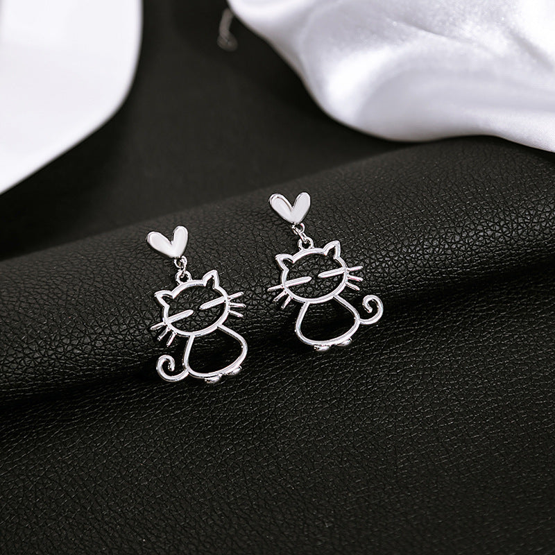 Boucles d'oreilles en métal à aiguille argentée, tempérament de chat mélancolique, asymétriques simples