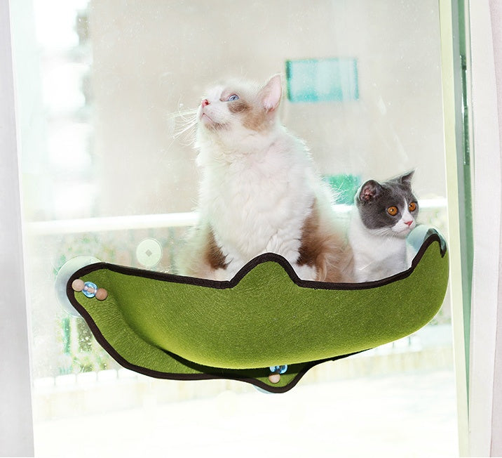 Hamaca para gatos en el alféizar de la ventana
