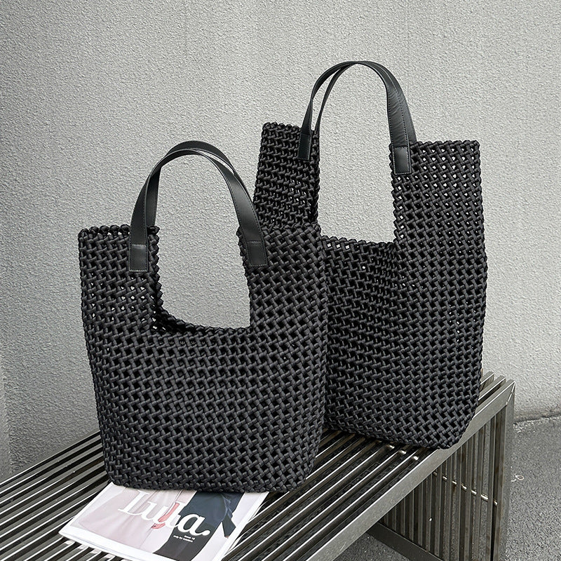 Bolso tejido a mano de lujo ligero, satén de seda, nudo de molino de viento, hueco, diseño de interés especial