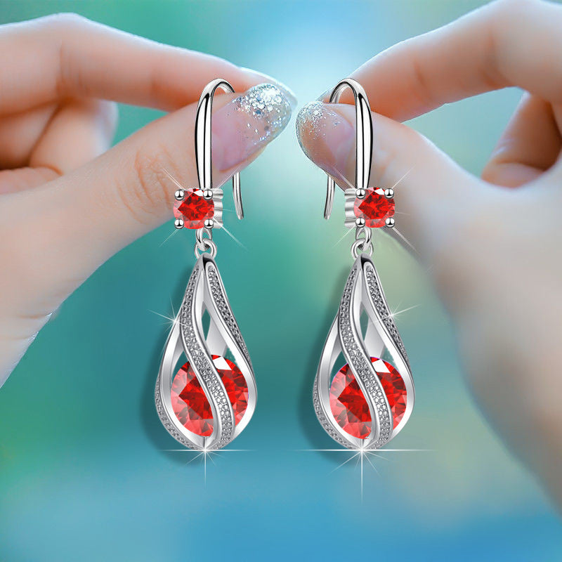 Boucles d'oreilles en forme de larme rotative pour femmes