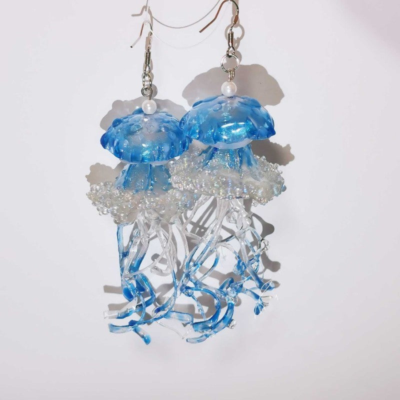 Boucles d'oreilles méduses longues faites à la main en résine créative