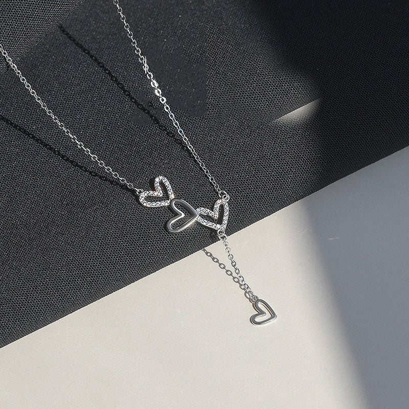 Collier de conception minoritaire de luxe léger à pampilles en forme de cœur