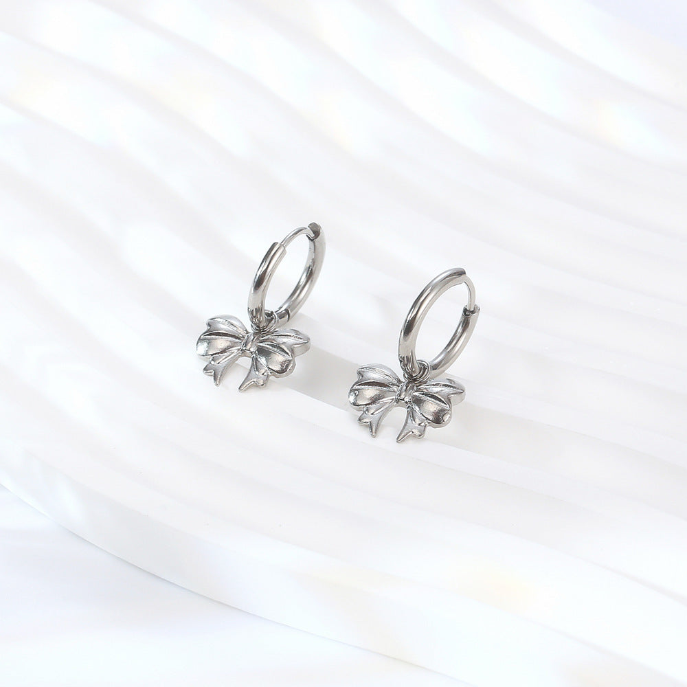 Boucle d'oreille à nœud en acier et titane pour femmes