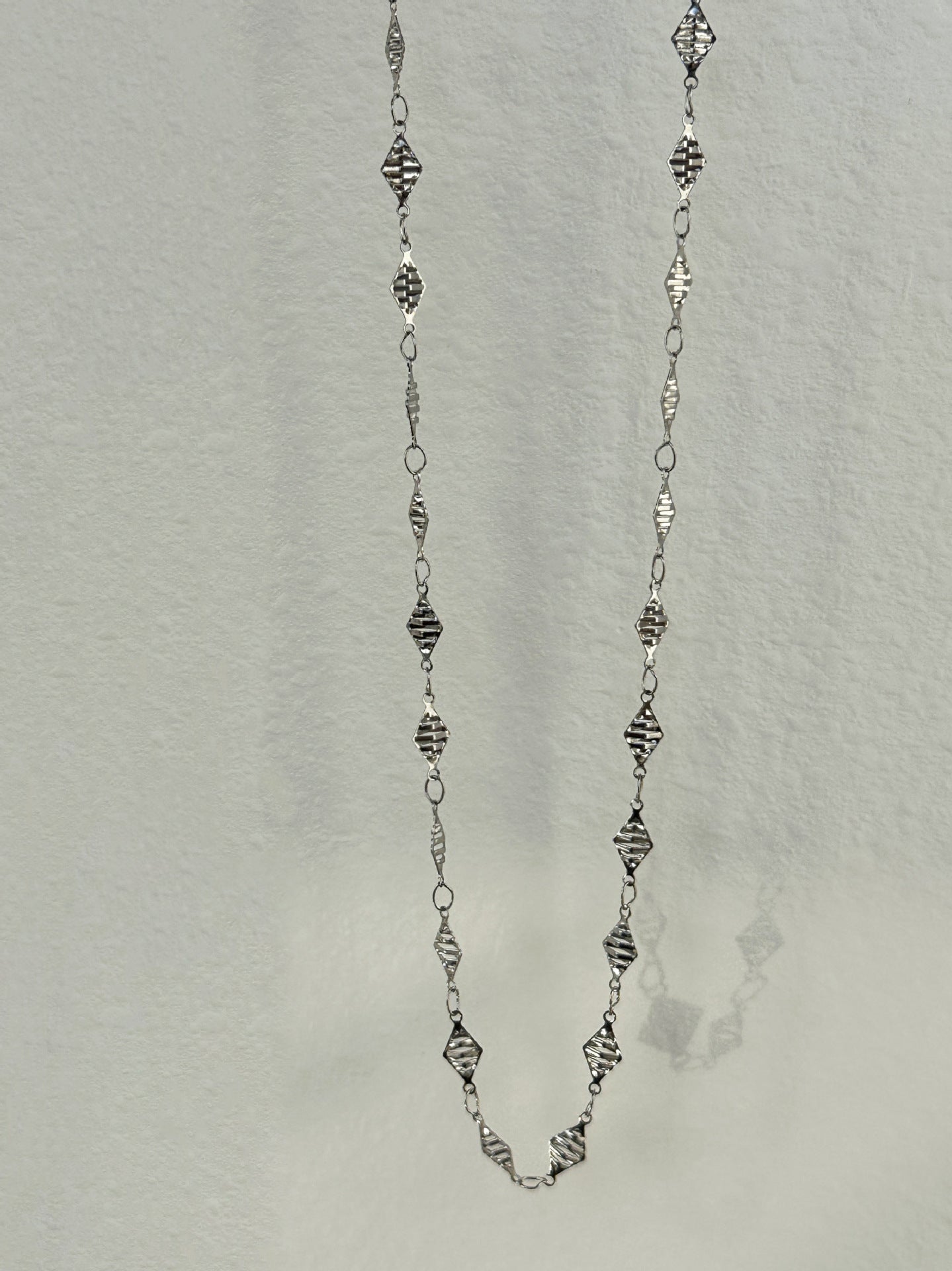 Cadena de cintura con pieza de diamante y borla vintage de acero y titanio chapado en oro