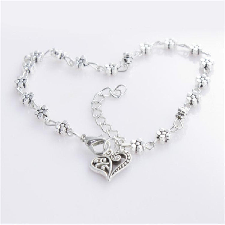 Bracelet de cheville tibétain en argent creux en forme de fleur de prunier, ornements de pied en forme de cœur