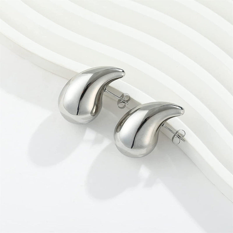 Pendientes de gota de agua de metal con una sensación de lujo de nicho