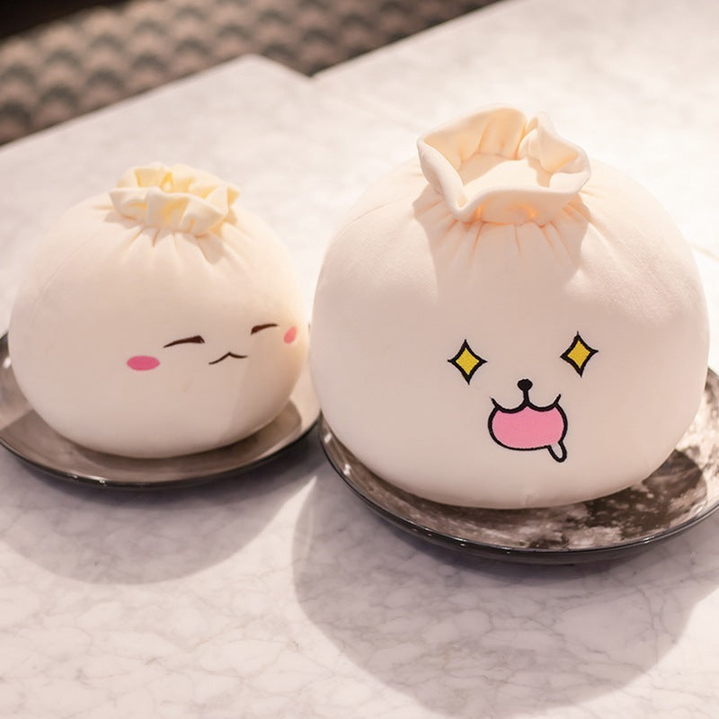 Expression douce et mignonne, un chignon en peluche, oreiller en pâte élastique