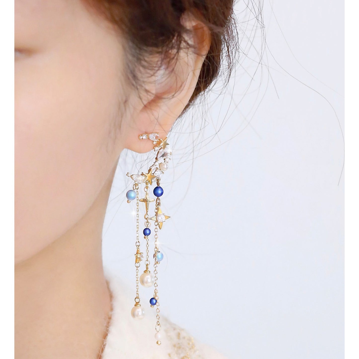 Boucles d'oreilles féeriques à effet fin avec pompon long