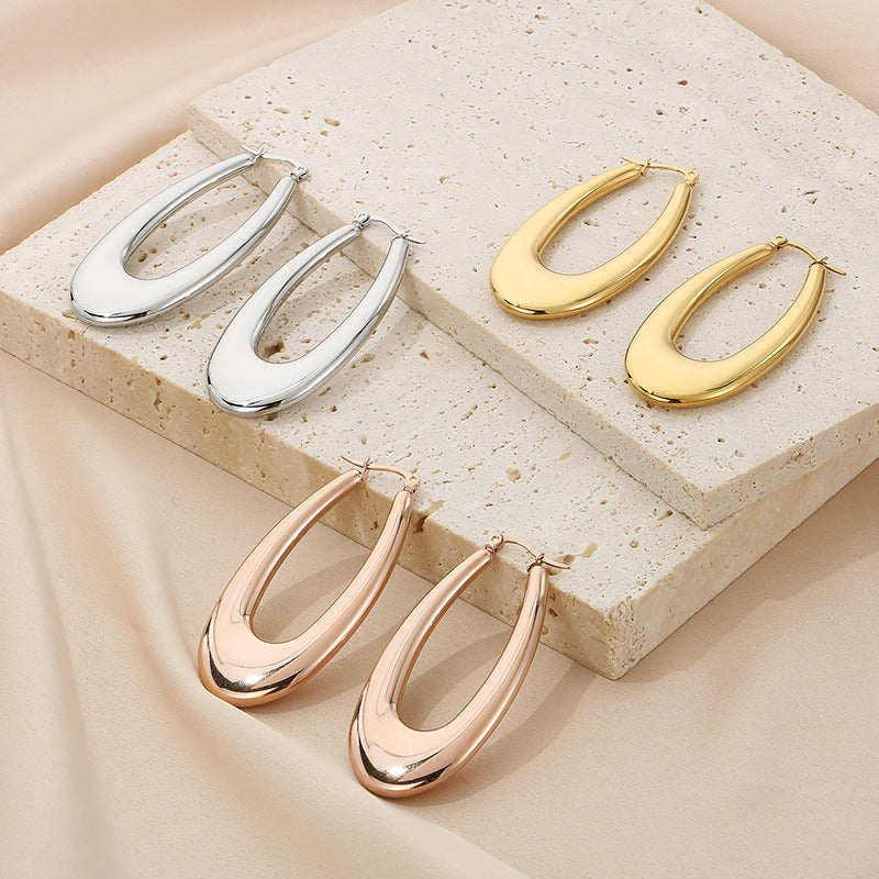 Clip d'oreille brillant en forme de U en acier titane plaqué boucles d'oreilles creuses 18 carats