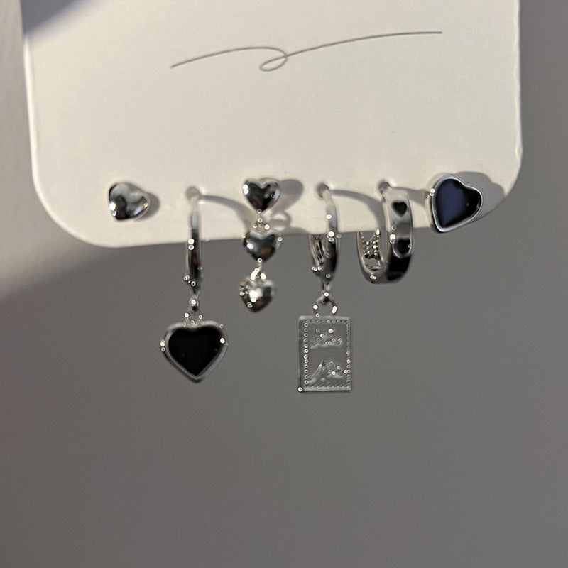 Ins intérêt spécial lumière luxe noir goutte à goutte amour coeur boucles d'oreilles costume